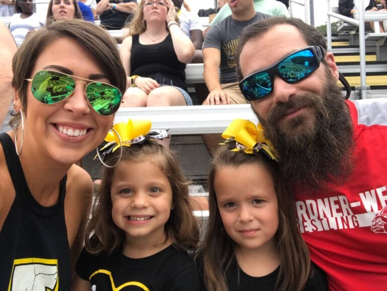 family of four at game