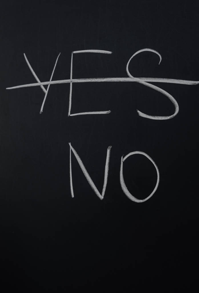 chalkboard with yes crossed out and the word no showing instead