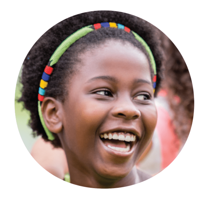 face of smiling african american girl with bright headband