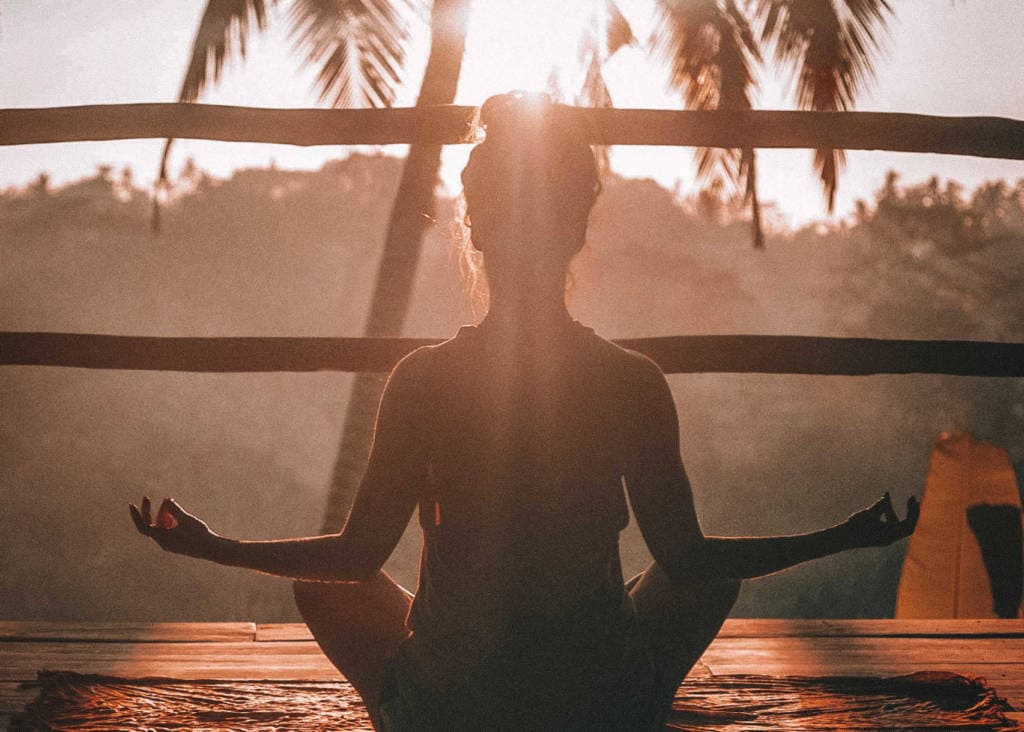 woman practicing yoga