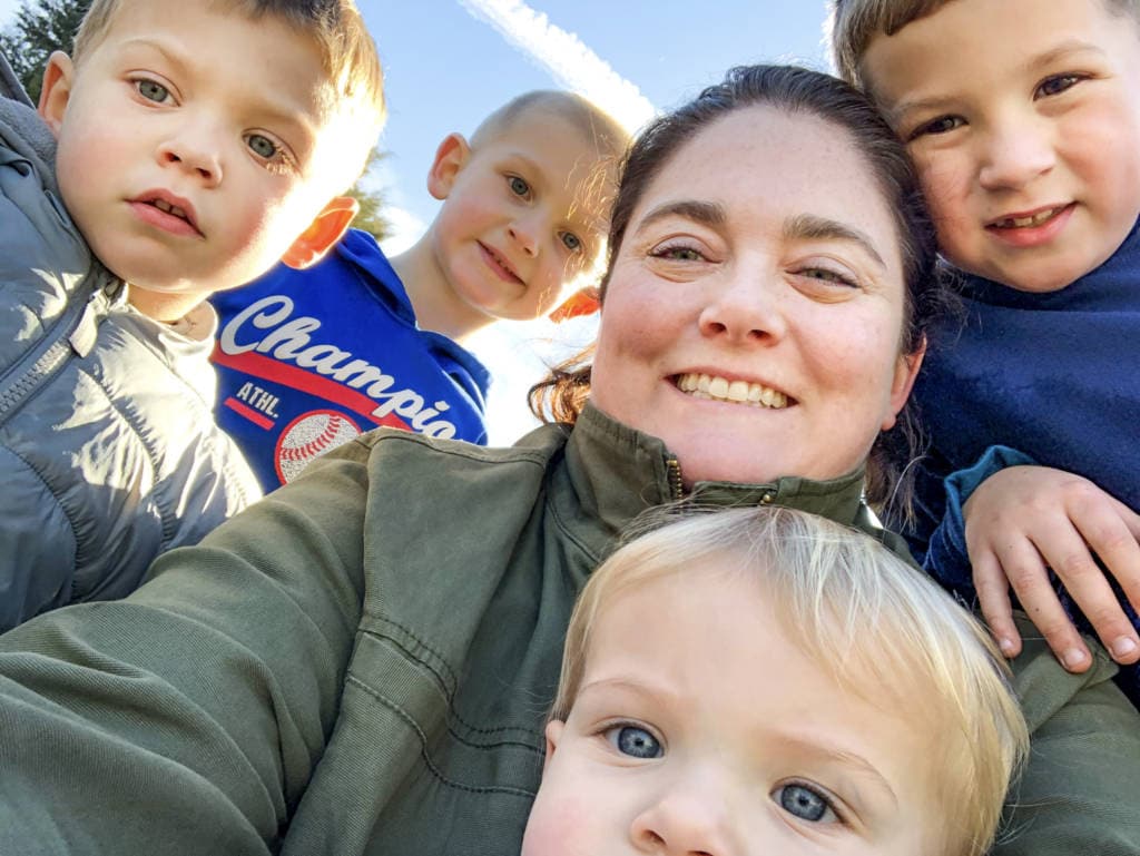 Kristen surrounded by all five kids for an up close selfie