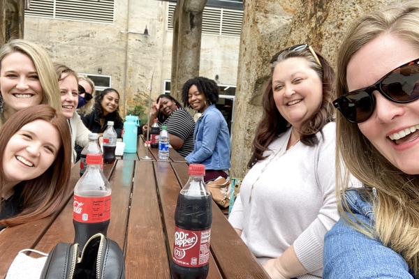 Crossnore's program excellence team at a team lunch outside at a picnic table