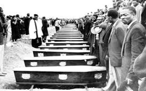 coffins lined up of those killed in Sharpeville, South Africa in 1960